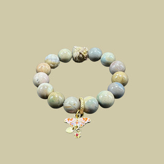 Serene Spectrum: Bracelet with Lionhead Charm &14K Gold-Plated Butterfly Elegance - front view