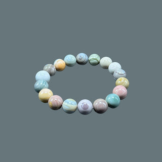 Astral Allure: Small Colorful Beaded Bracelet with Enchanting Opaque Gemstone Highlights - front view