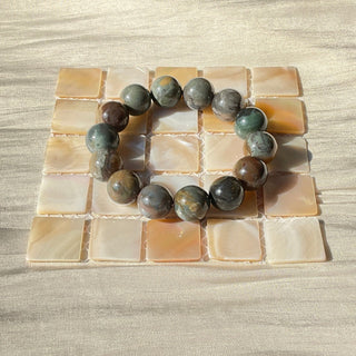 Universe Unraveled: Beaded Bracelet with Celestial Texture Mirroring the Galaxy's Ethereal Beauty - under the sunshine