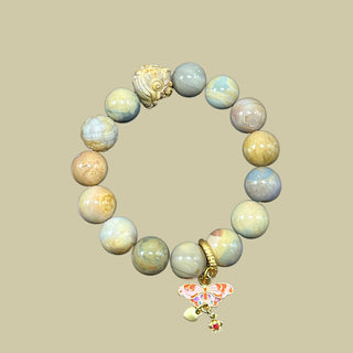 Serene Spectrum: Bracelet with Lionhead Charm &14K Gold-Plated Butterfly Elegance - high angle