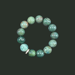 Verdant Veins: Glimering Emerald Green Beaded Bracelet with Ingenious Charm - high angle